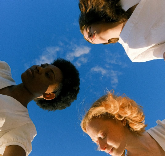 Ladies in group, looking down