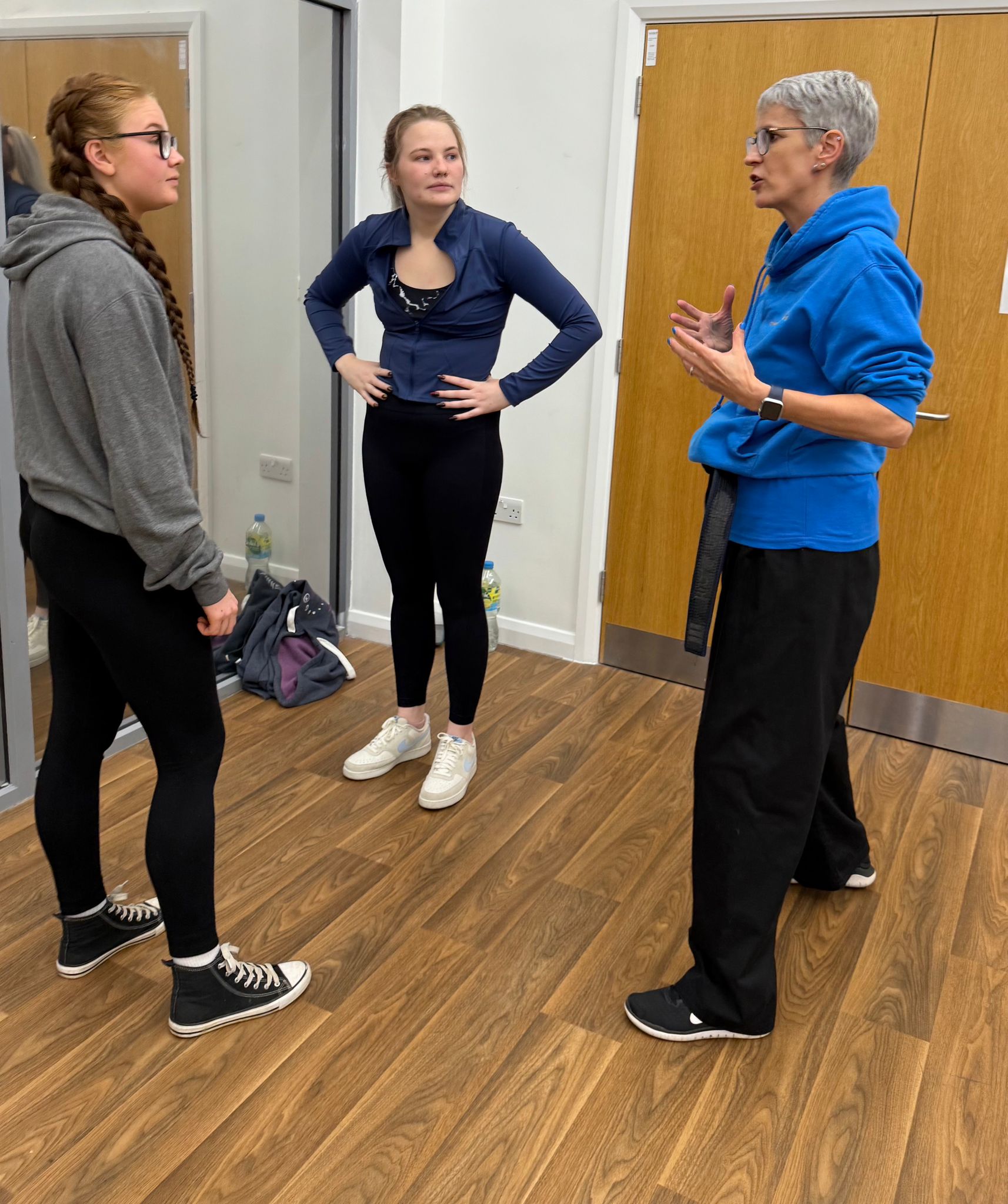 Natalie Bruden talking to two ladies