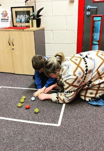 Parent and child playing