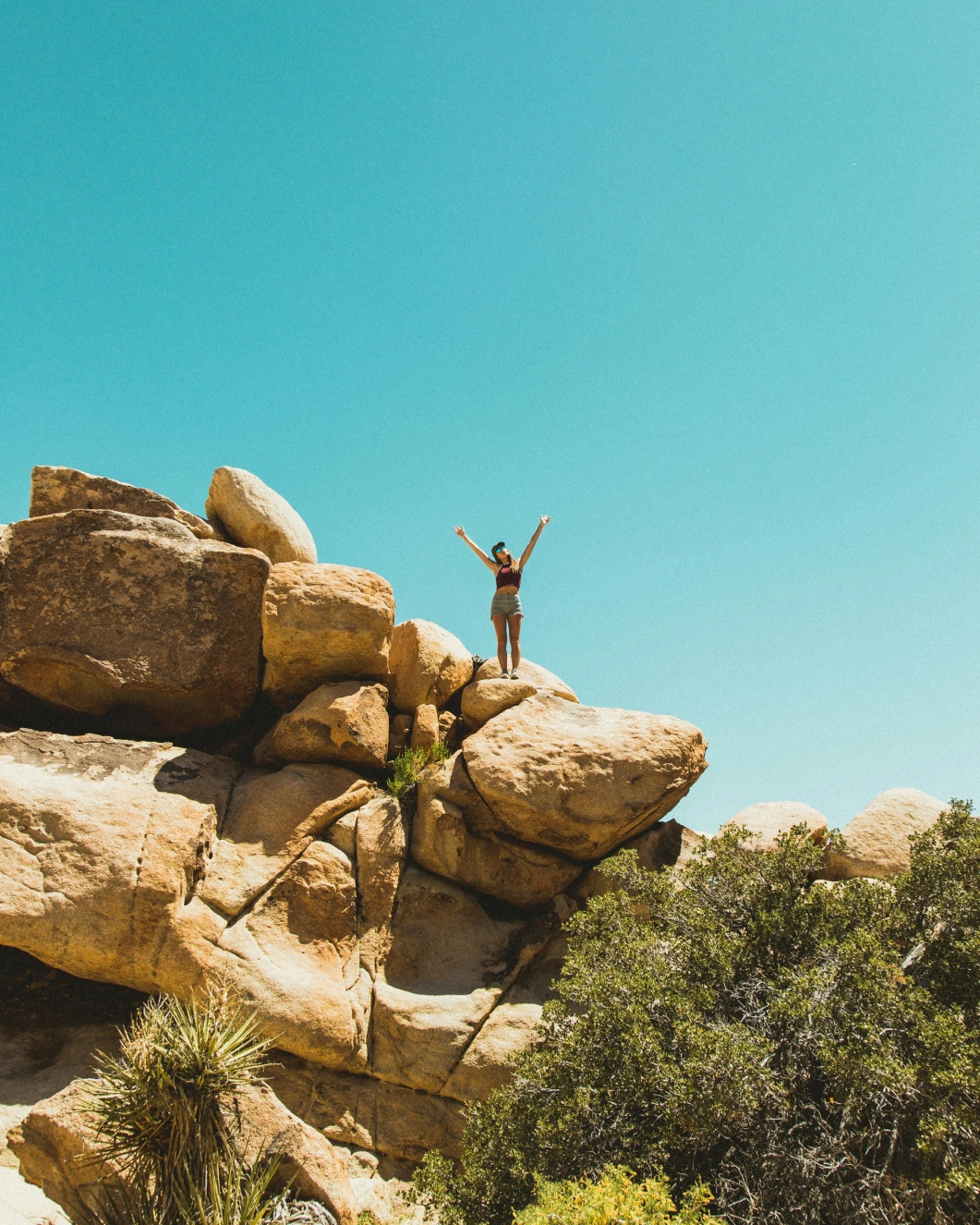 Lady standing on rocks